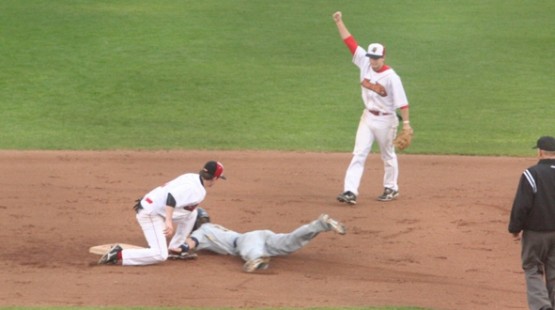 UHV's Cory Hulsey applies the tag to retire and LSU-Shreveport runner trying to steal on Monday.